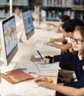 Students learning on computers